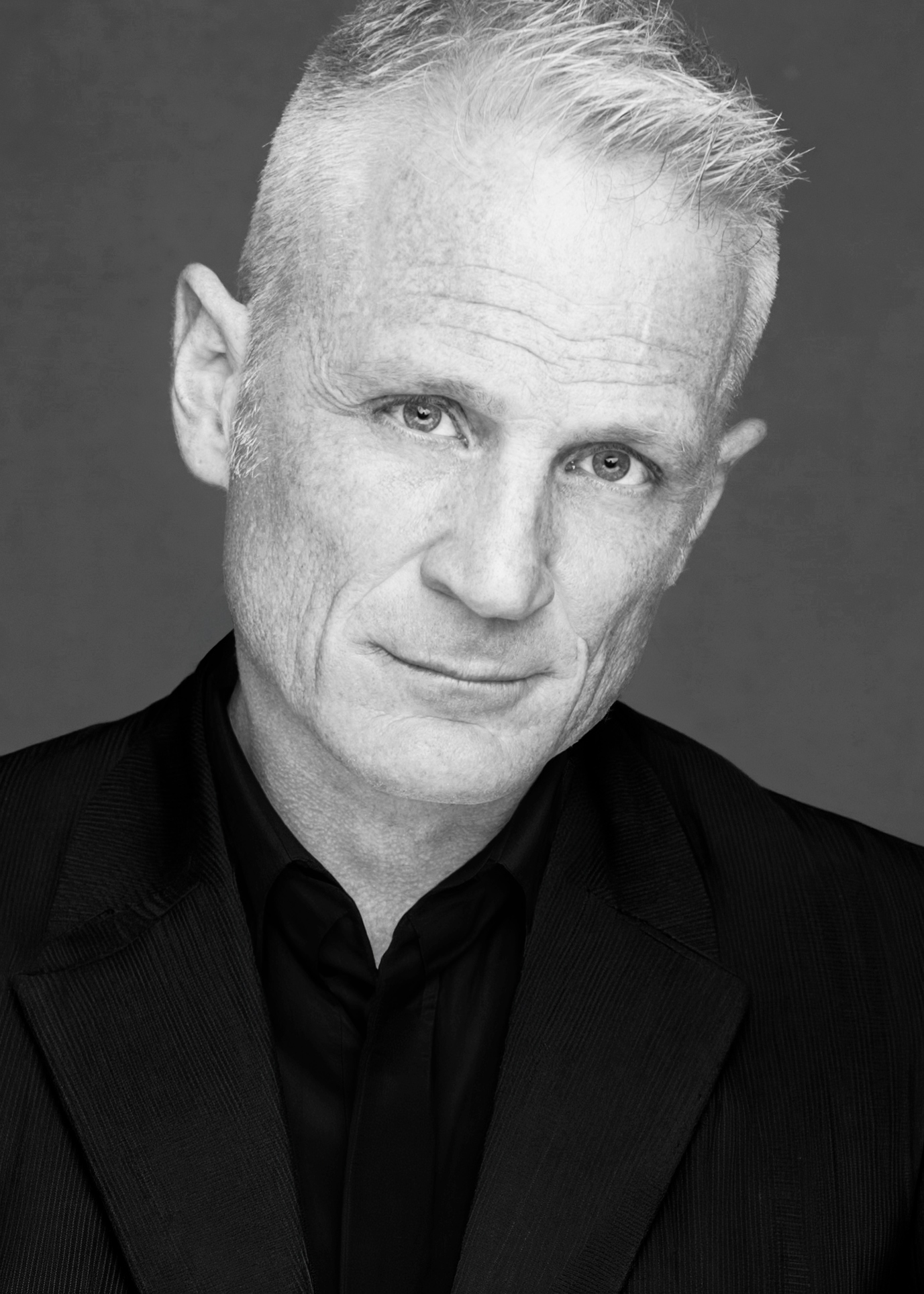 Black and white editorial headshot